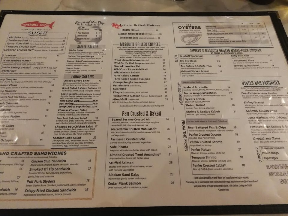 Seafood restaurant menu with soups and sandwiches.