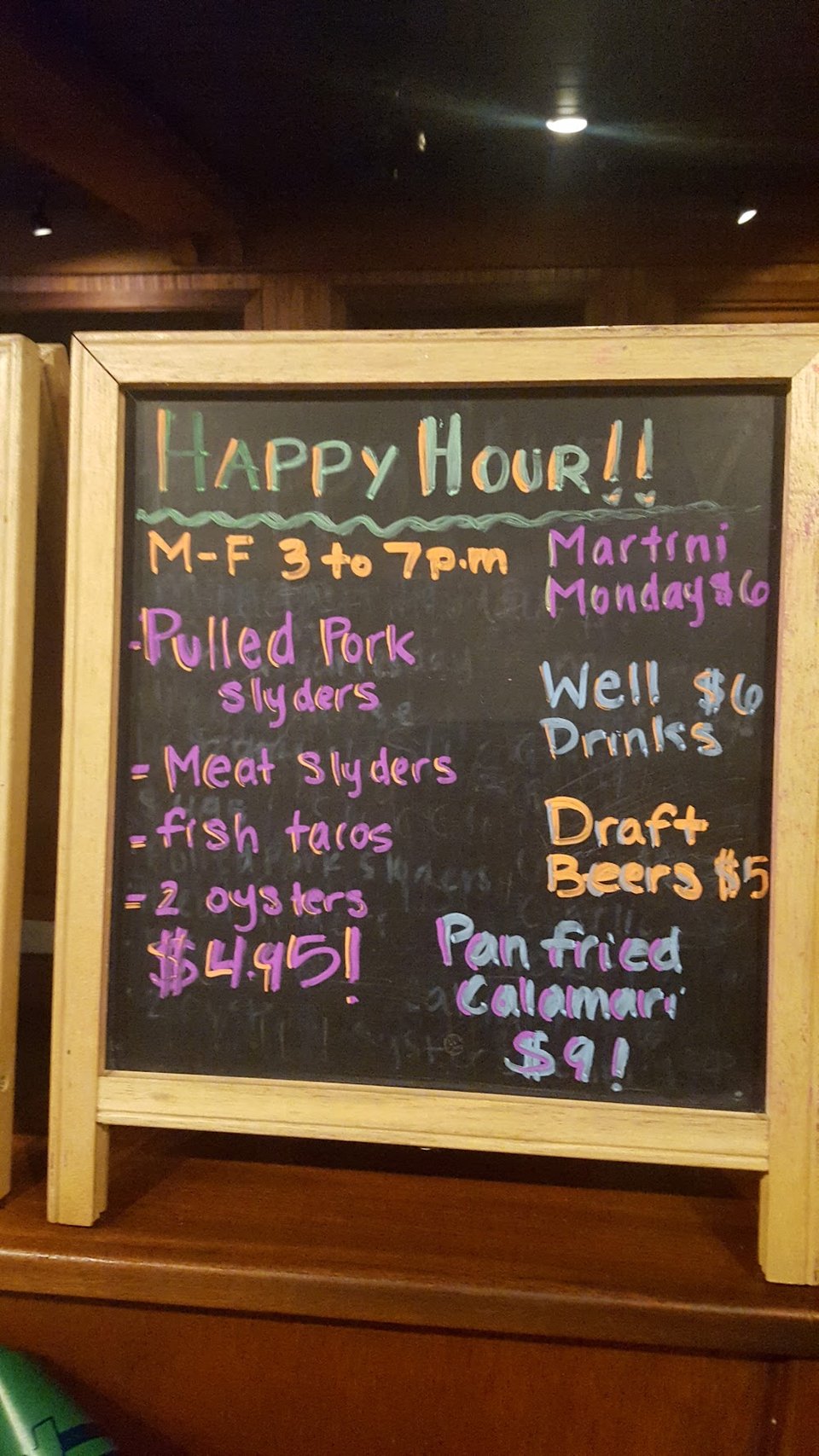 Menu page with seafood appetizers and salads.