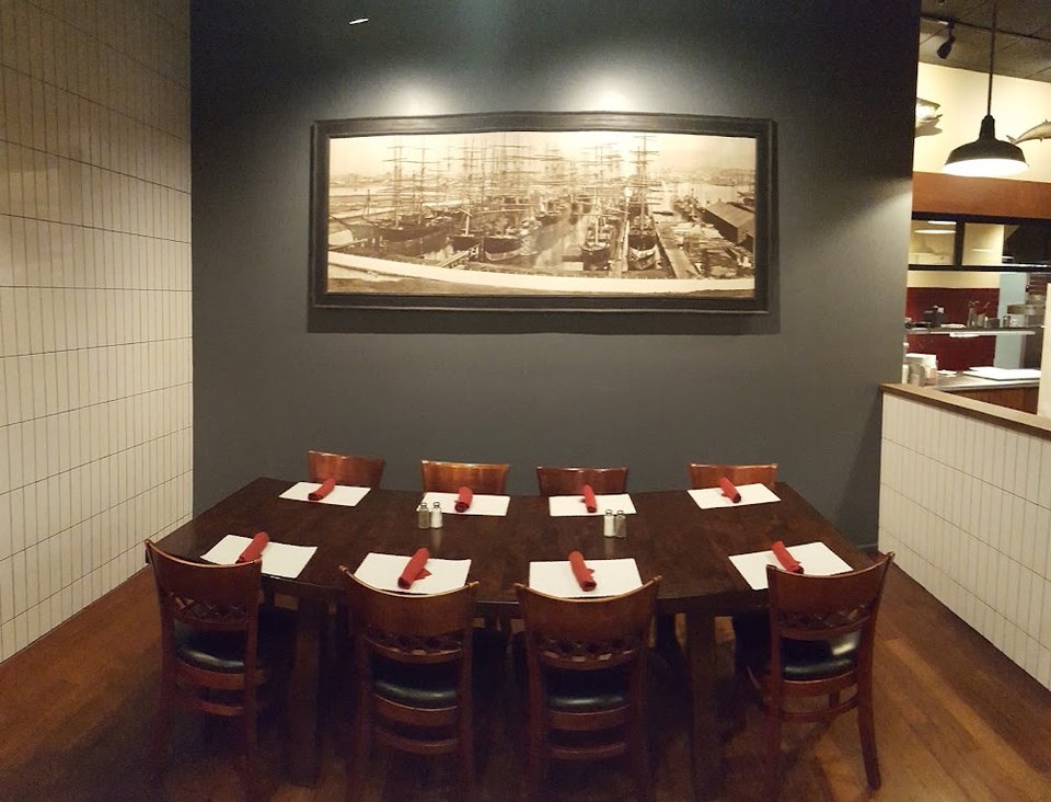 Printed menu featuring chowder, sushi, and grilled entrées.