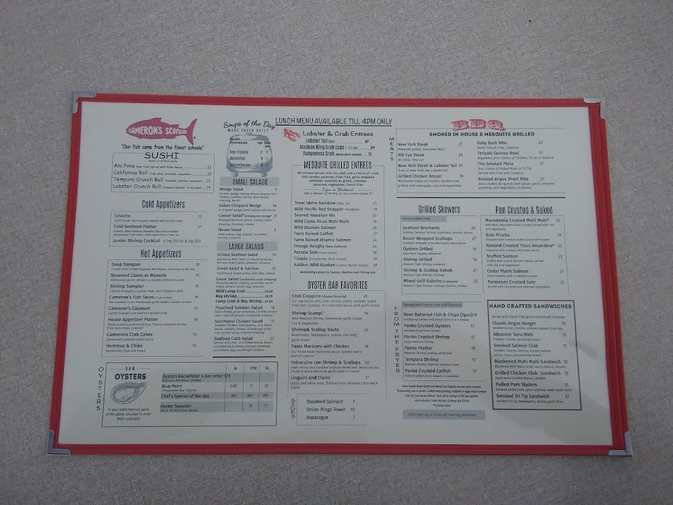 Seafood restaurant menu with soups and sandwiches.