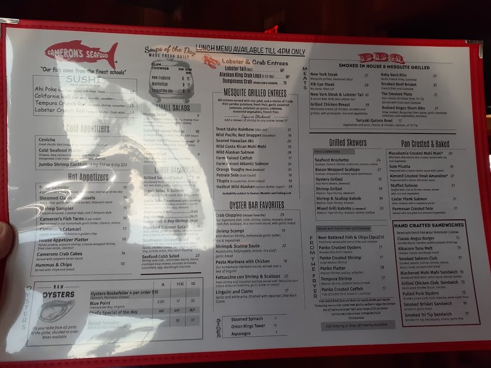 Seafood restaurant menu with soups and sandwiches.