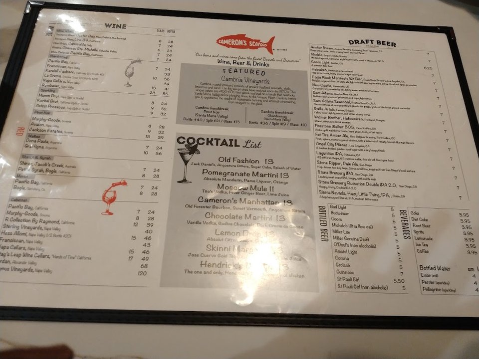 Menu page with seafood appetizers and salads.